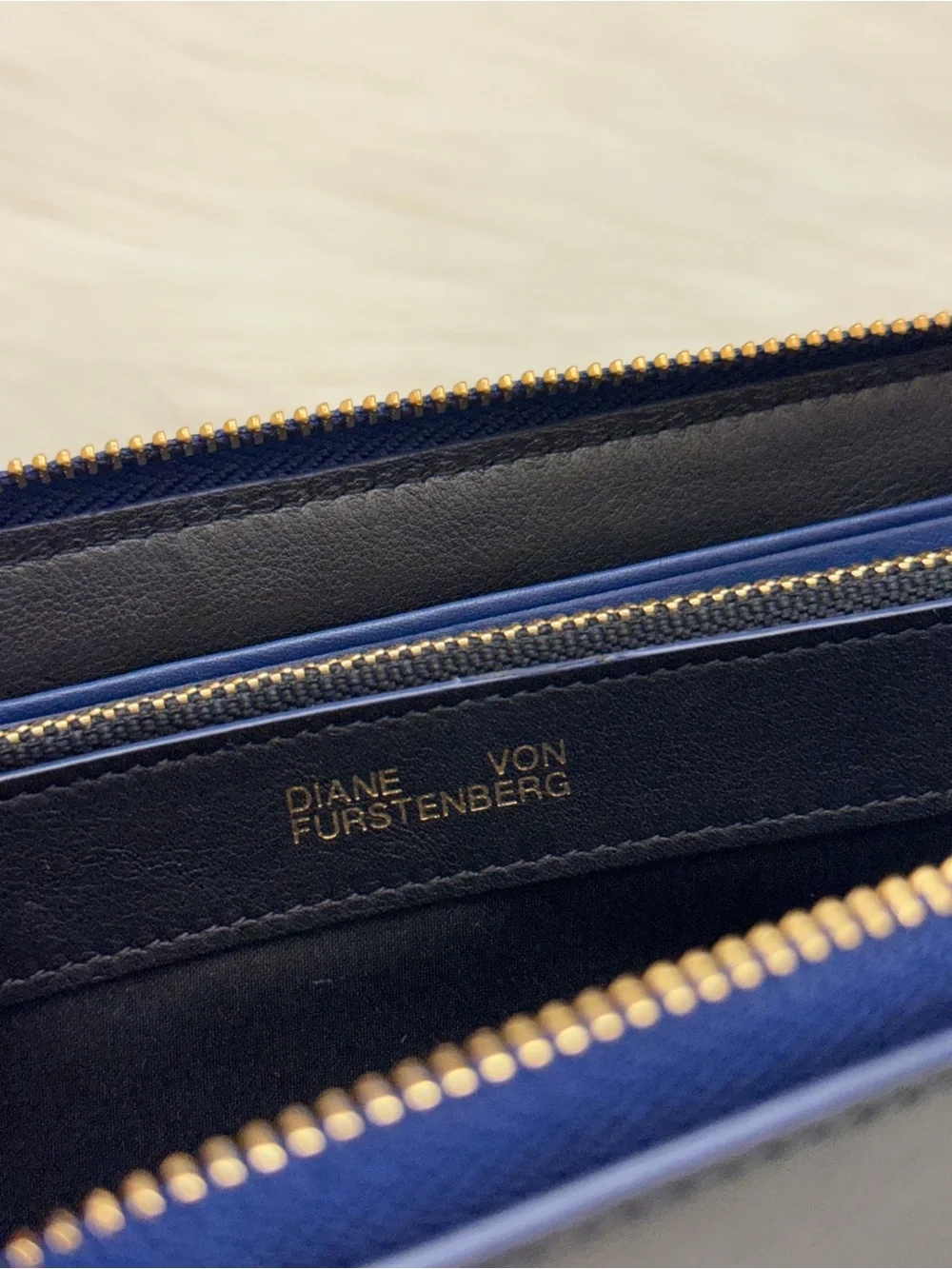 DIANE VON FURSTENBERG - BLACK BLUE SOFT ALL LEATHER ZIP AROUND LONG WALLET